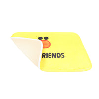 Yellow cartoon floor mat with duck face, folded edge showing woven backing