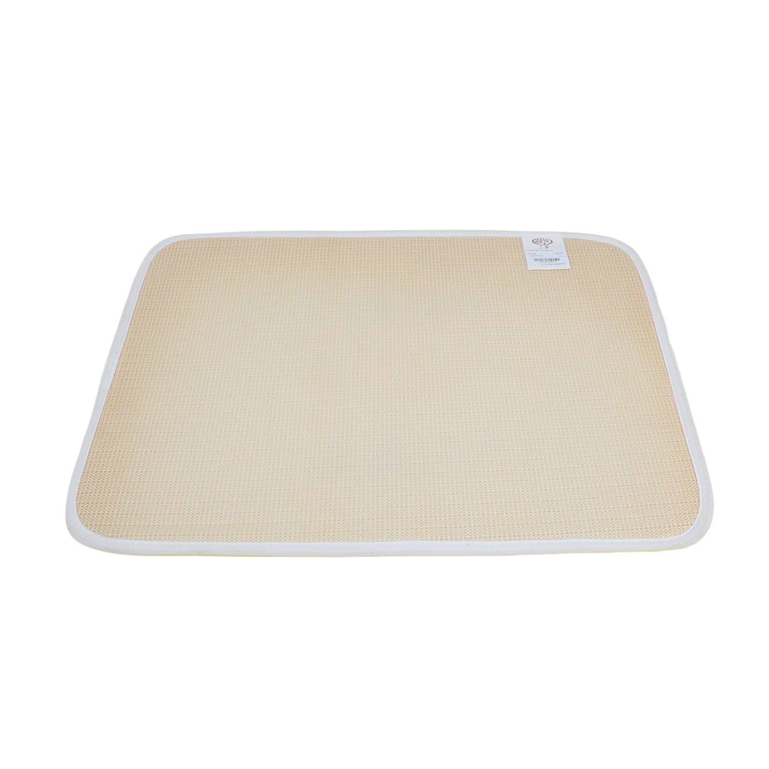 Beige woven floor mat with white trim and small label