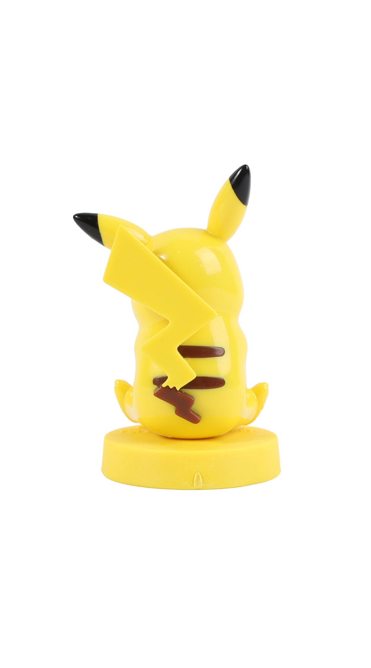 Pikachu yellow collectible figurine, back pose with black markings, on round base