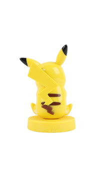 Pikachu yellow collectible figurine, back pose with black markings, on round base