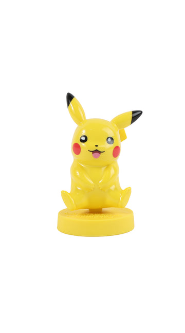 Pikachu yellow collectible figurine, red cheeks and black-tipped ears, on round base