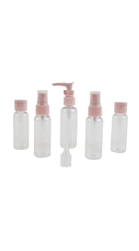 Clear travel bottles set of 7, with pink screw caps and pump top