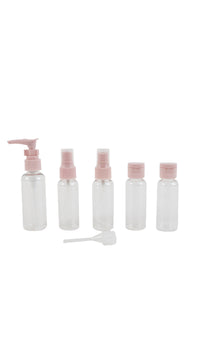 Clear travel bottle set, 7 pieces with pink pumps and caps