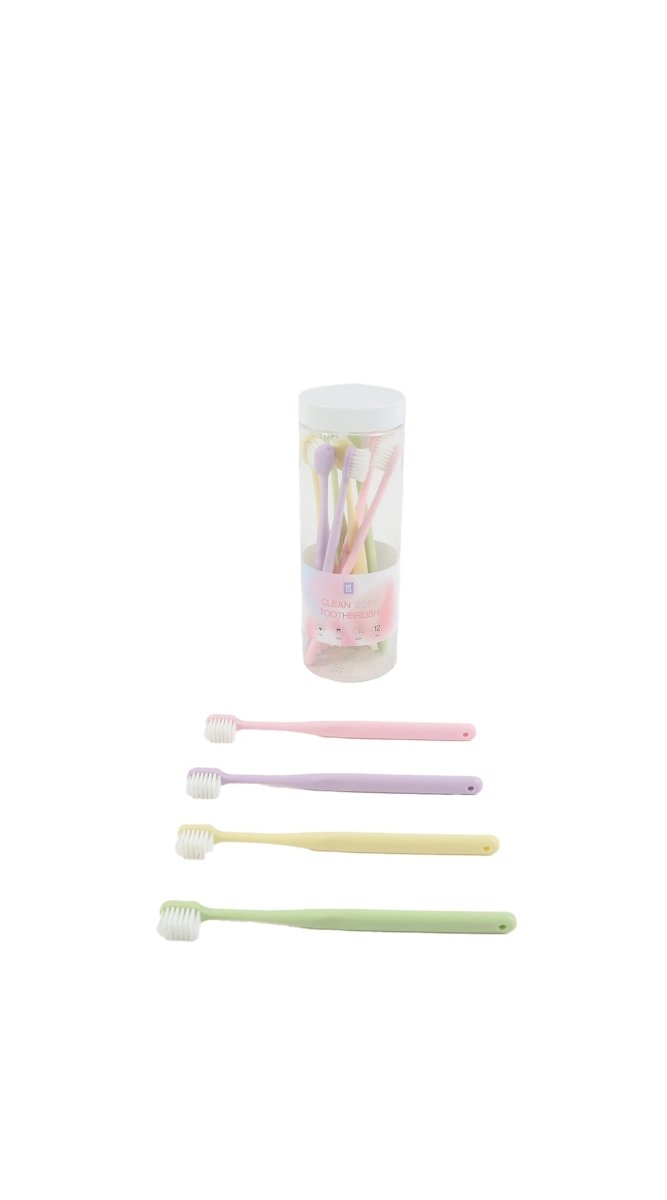 Soft toothbrushes set with four pastel handles and one extra brush, side view