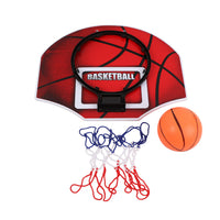 Red portable basketball goal with black rim, net, and orange basketball