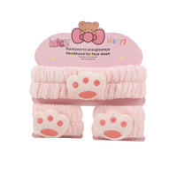 Pink plush headband set with matching wristbands, bear paw prints in blush