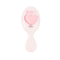 Light pink oval cushion hair brush with heart graphic and pink bristle tips