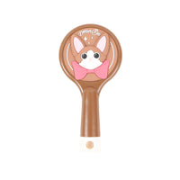 Brown round cat cushion brush with Devon Rex face and pink bow graphic