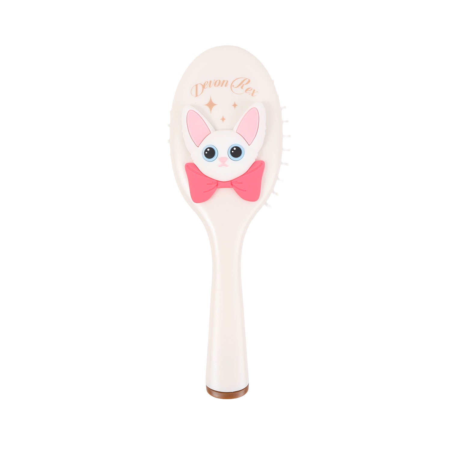 Off-white oval cushion hair brush with cartoon cat face and bow on handle