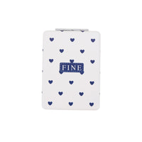 Double-sided compact mirror with navy heart pattern and “FINE” label