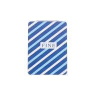 Double-sided compact mirror with blue-and-white diagonal stripe pattern and “FINE” label
