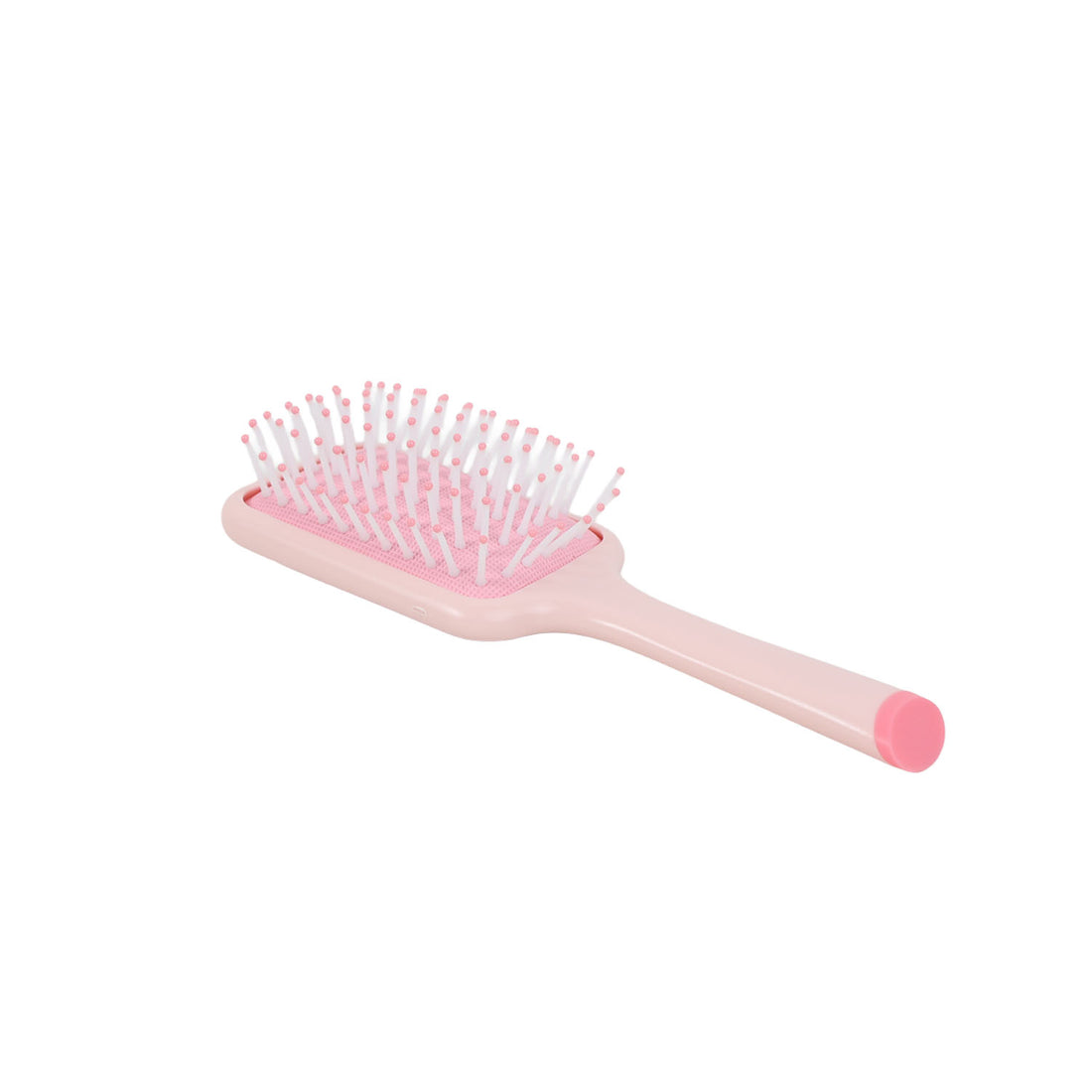 Pink square cushion hairbrush with dense bristle pad and short handle