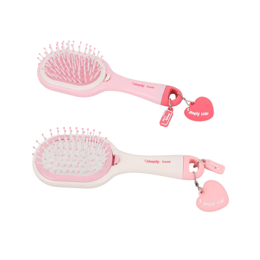 Pair of oval cushion hairbrushes with heart pendant charms, pink and off-white