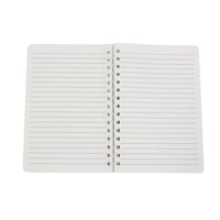 Open ruled notebook with white pages and metal spiral binding