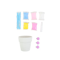 White flower pot with multicolor sand bags and flower pot decorations, including pink pieces