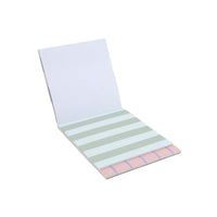 Memo pad with blank top page and light green striped note pages
