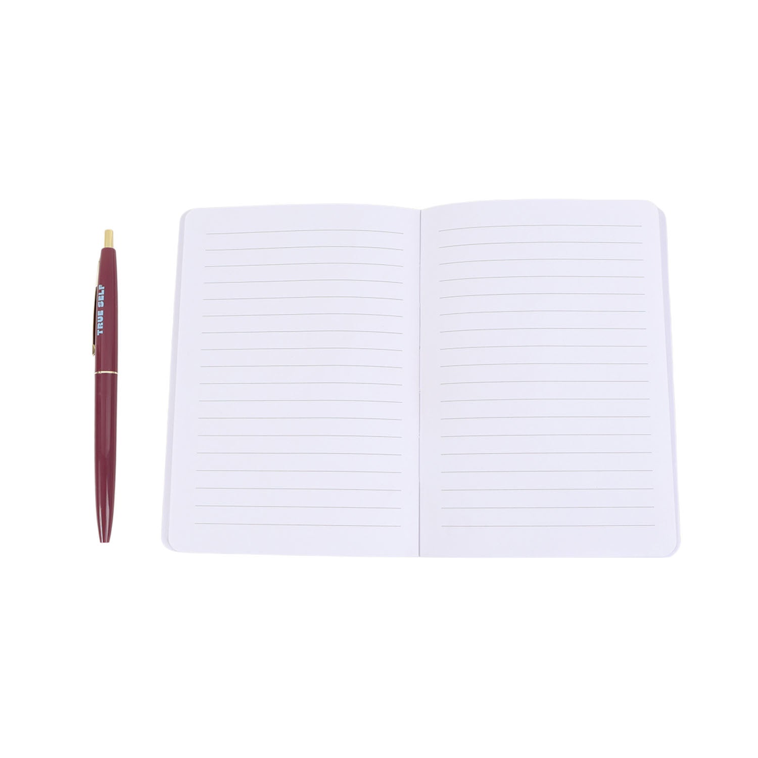 Open white lined notebook with maroon pen beside it