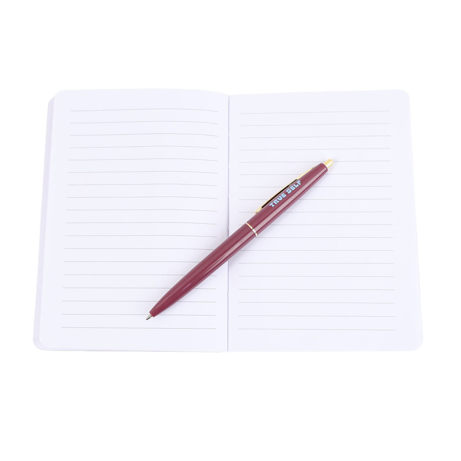 Open white lined notebook with maroon pen resting on right page