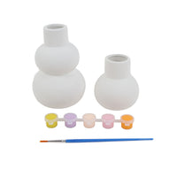 White ceramic vase painting kit with two vases, five paint pots, and blue brush