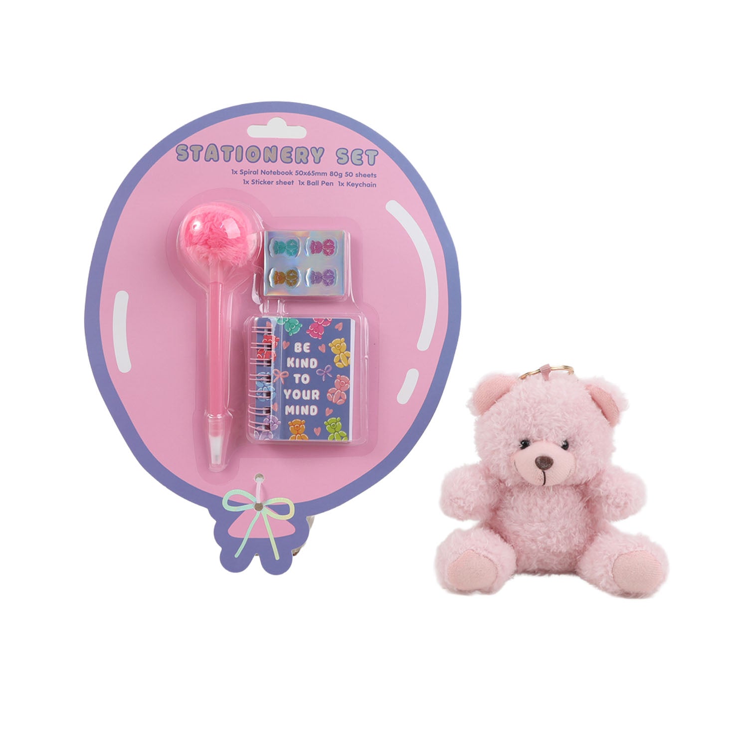 Pink plush bear keychain beside stationery set with notebook and pen