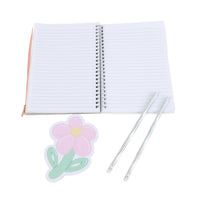 Spiral notebook set: open lined notebook with two pens and floral sticker, white pages