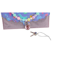 Hard-cover notebook front, purple glitter cover with bead charm snap clasp