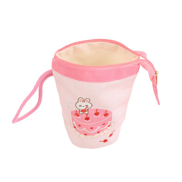 Pink canvas pencil case with zipper top, wrist strap, bunny-and-cherries print.