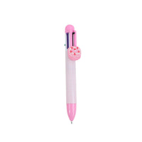 Six-color ballpoint pen with pink cap, front badge, and pointed tip