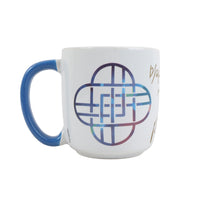White 13oz mug with blue handle and large circular grid logo in blue and gray