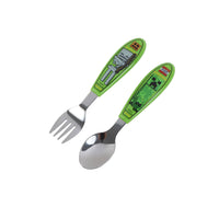 Metal spoon and fork with green Minecraft-style handles and character decals