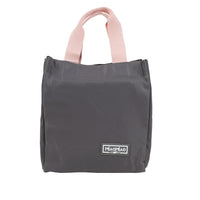 Dark gray handheld lunch bag with pink handles and logo patch on front.