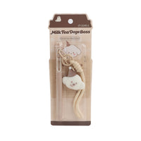 Push-button ballpoint pen in blister pack with cute character charm, beige.
