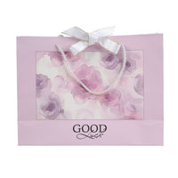 Light pink large gift bag with rope handles, floral print and 'GOOD Luck' text
