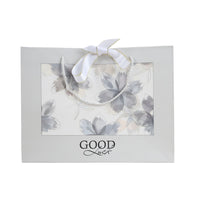 Gray large gift bag with rope handles, floral print and 'GOOD Luck' text