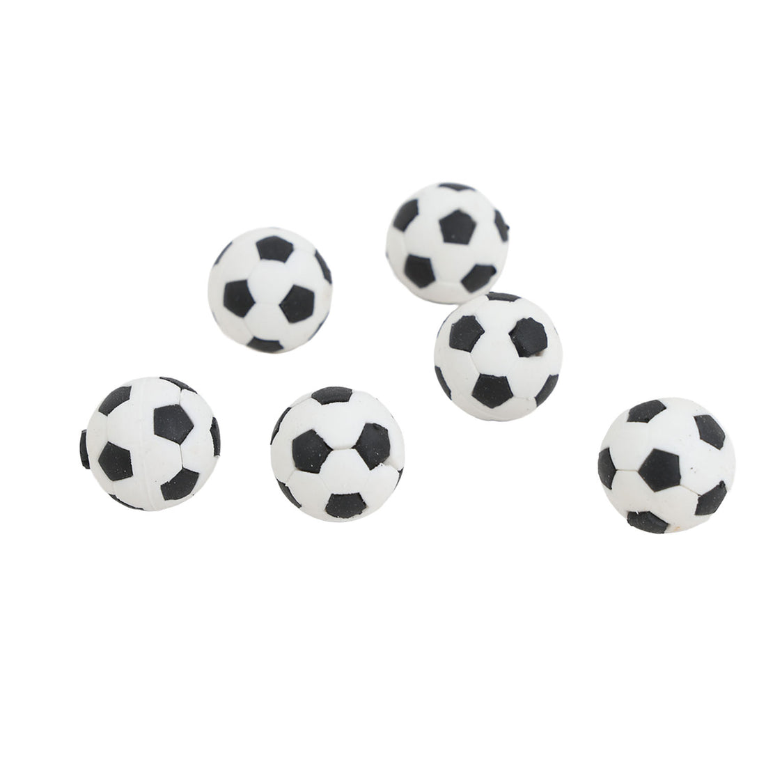 Set of soccer ball-shaped erasers, white with black pentagon patches
