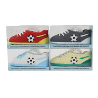 Set of four shoe-shaped football tape dispensers, boxed in red, gray, blue, and green