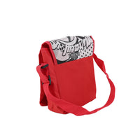 Back view of the red backpack showing its plain red panel and shoulder straps