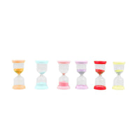 Row of seven 15-minute hourglasses with colored sand in multiple shades.