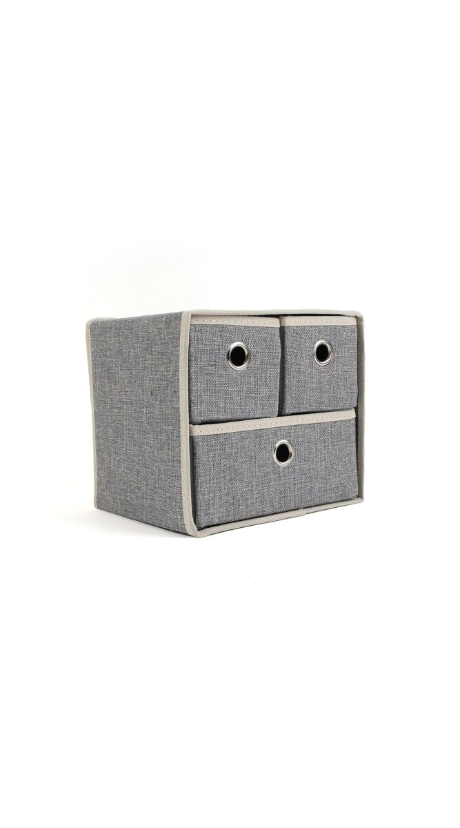 Grey 3-drawer fabric organizer with three fabric bins and circular cutout handles