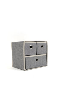 Grey 3-drawer fabric organizer with three fabric bins and circular cutout handles