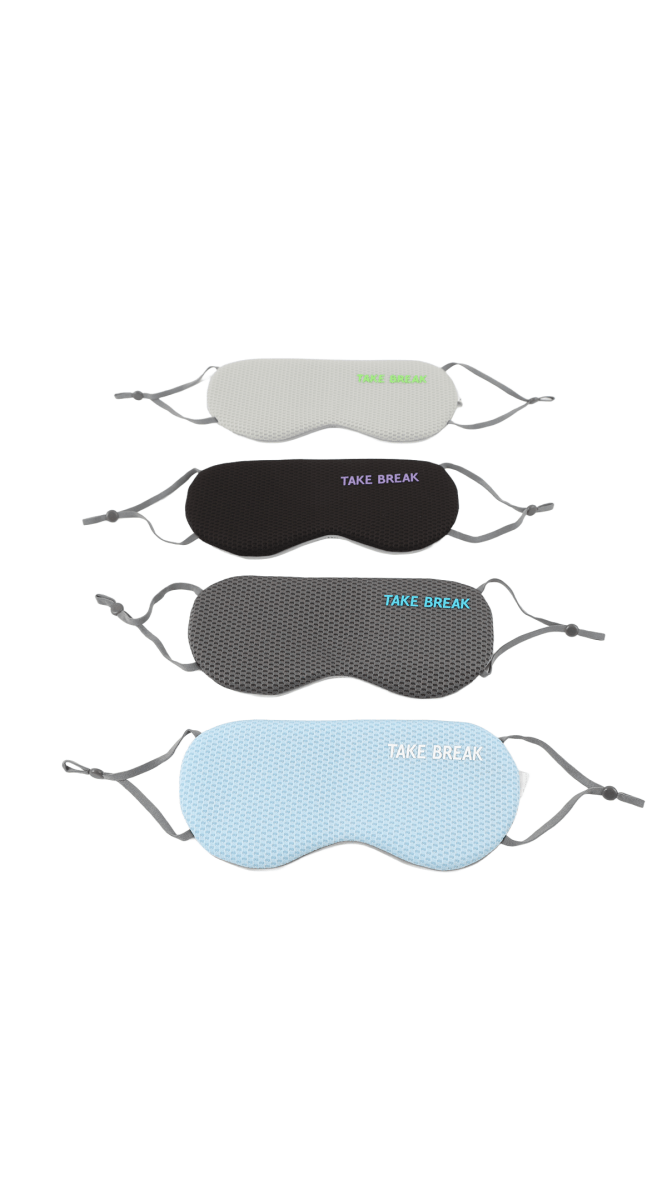 Assorted 3D sleep eye masks in light gray, black, dark gray, and blue tones with straps