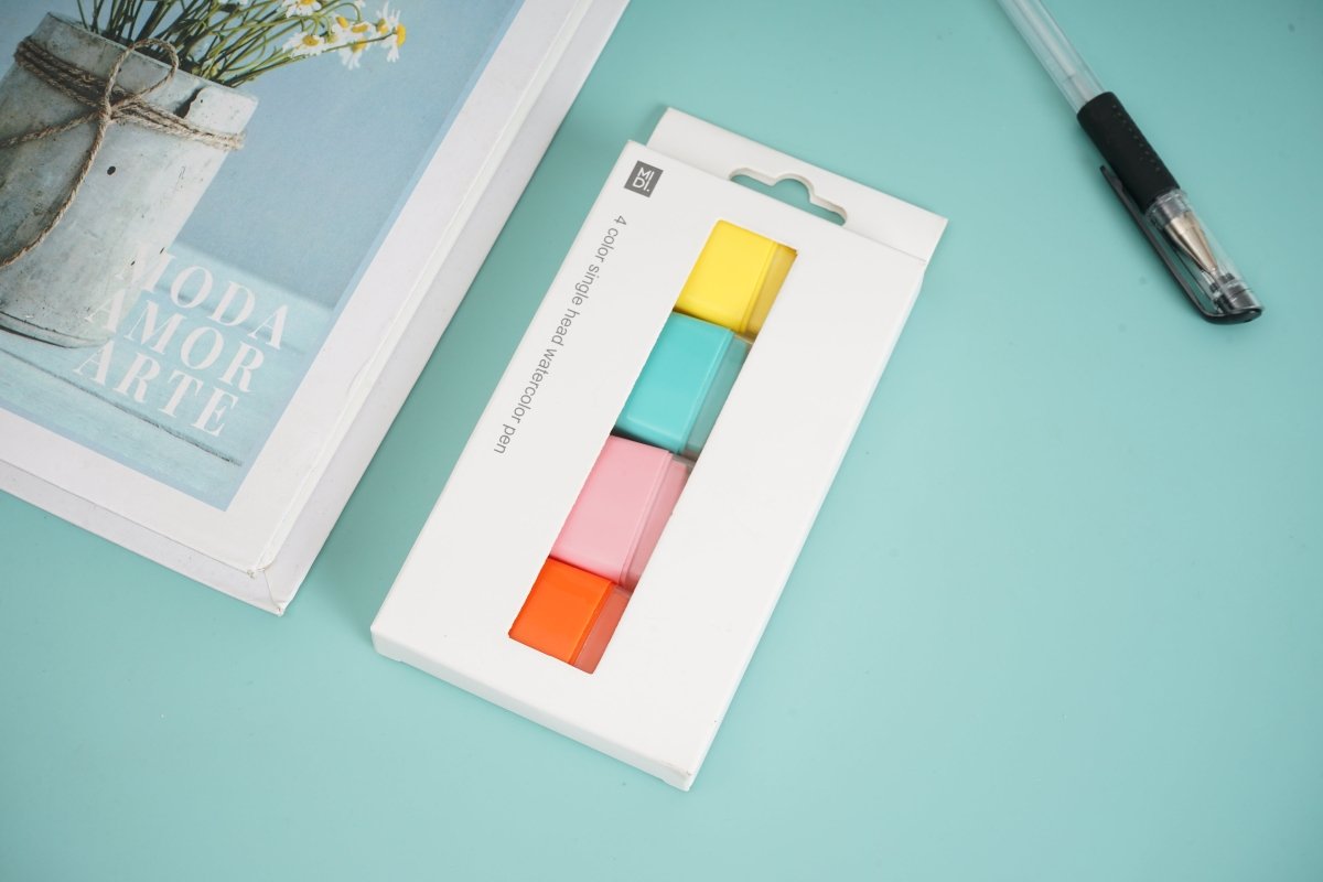 Packaged 4-color highlighter set with yellow, green, pink, and orange