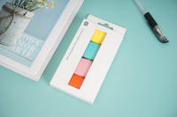 Packaged 4-color highlighter set with yellow, green, pink, and orange