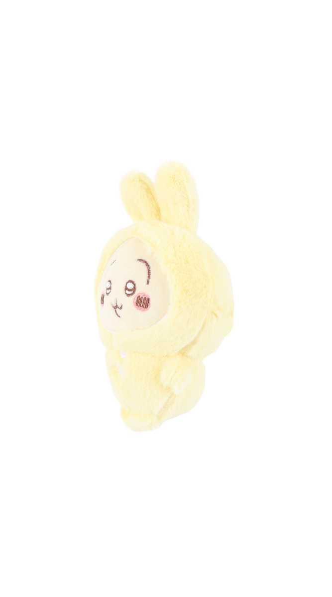 Yellow plush pajama hooded character with embroidered face, side view