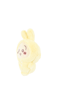Yellow plush pajama hooded character with embroidered face, side view