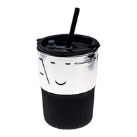 450ml insulated coffee cup with black lid, straw, white upper and black ribbed base