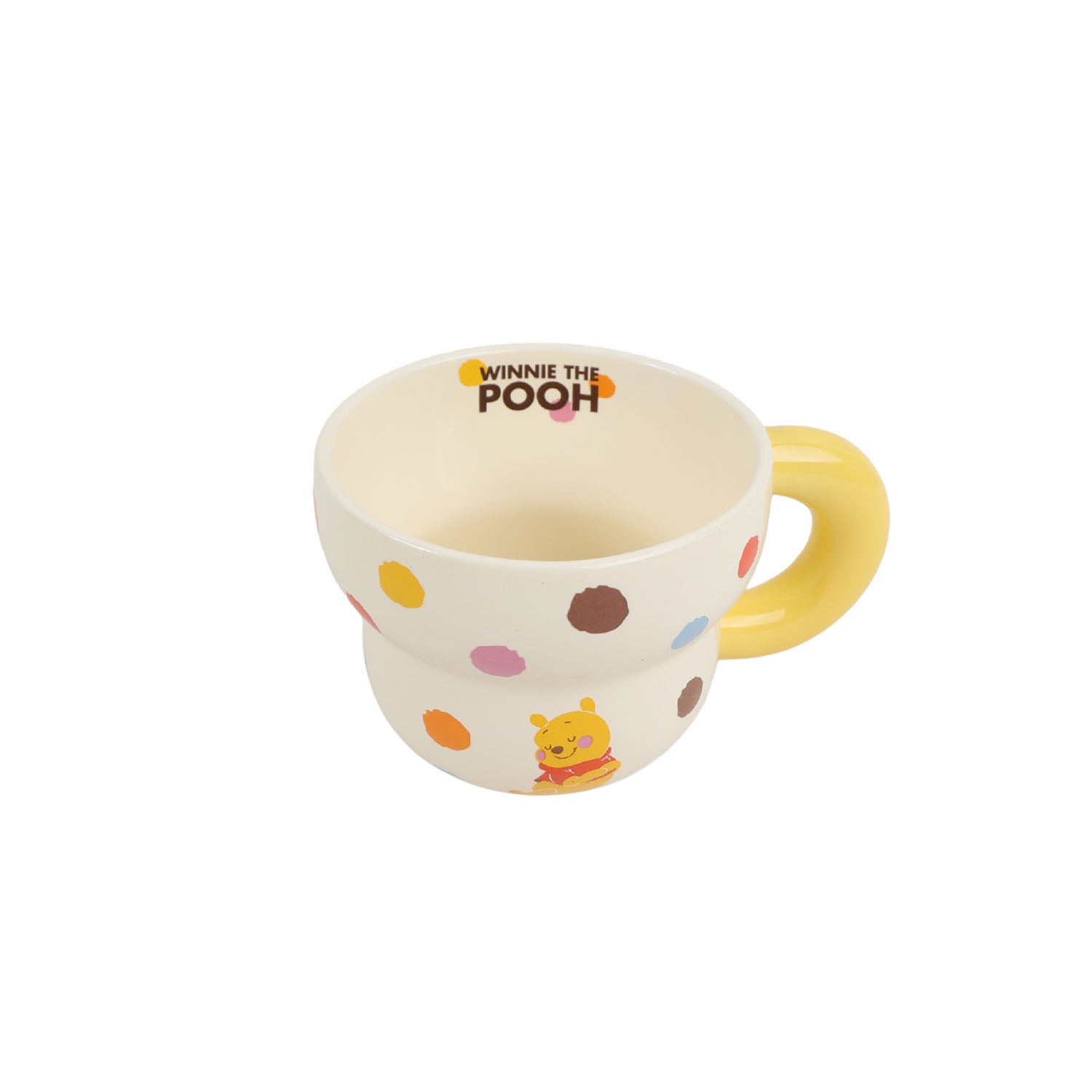 Winnie the Pooh ceramic cup with yellow handle, cream base and multicolor dot pattern