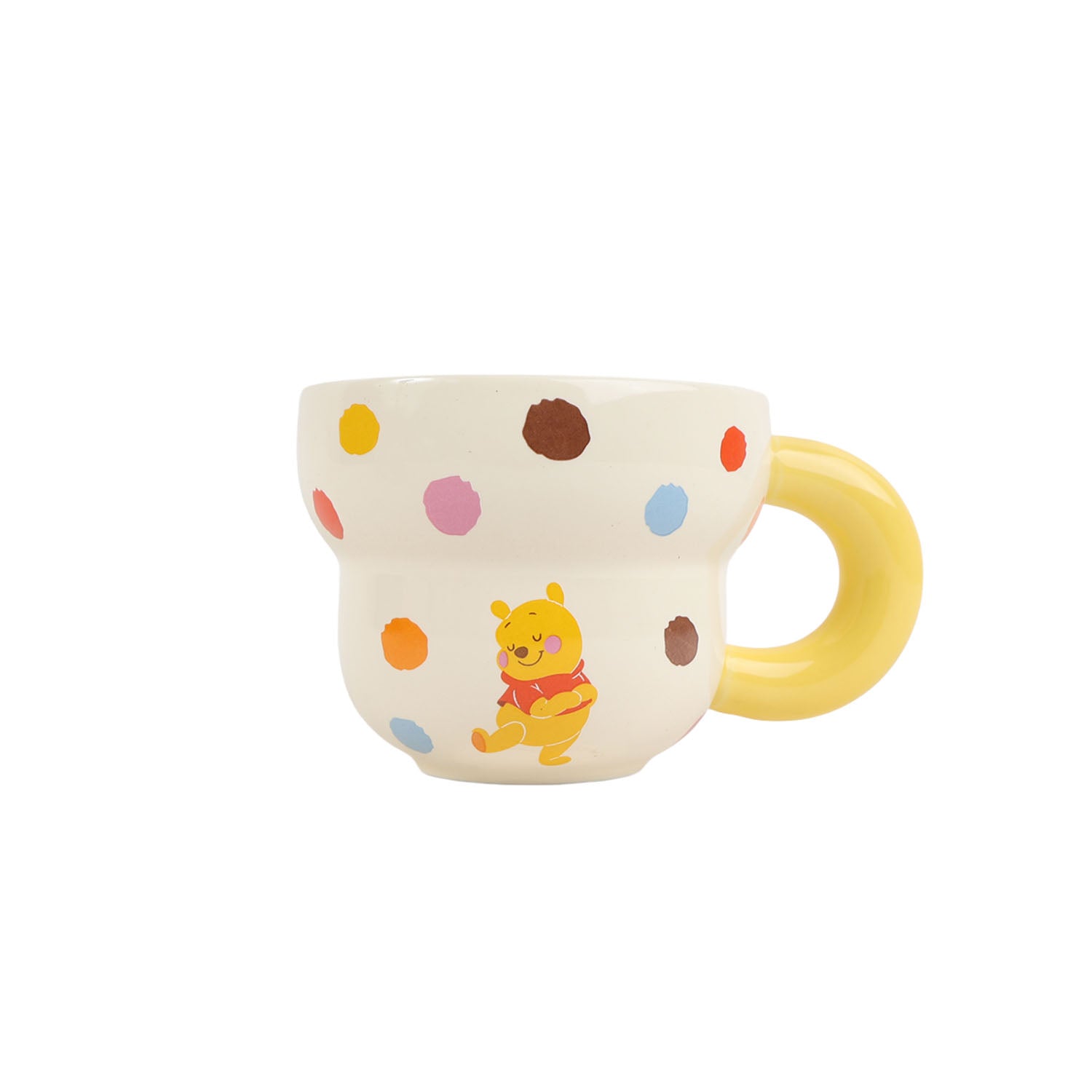Winnie the Pooh ceramic cup with yellow handle, cream base and Winnie the Pooh center graphic