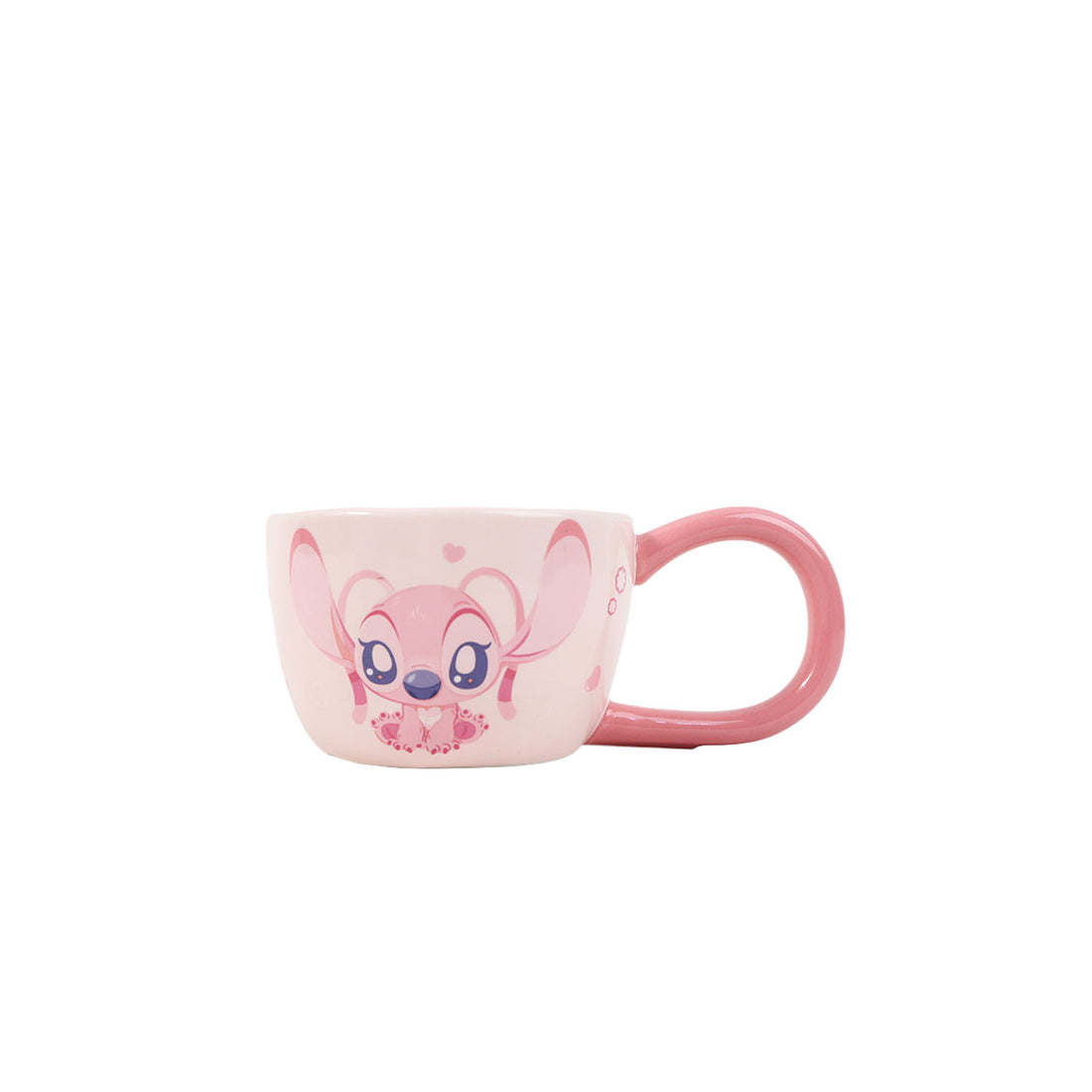 Pink ceramic coffee cup with long handle and angel character graphic, side view