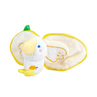 Yellow plush duck opened wide with the inner chick visible